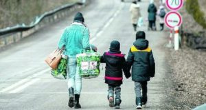 Bambini ucraini in fuga dalla guerra